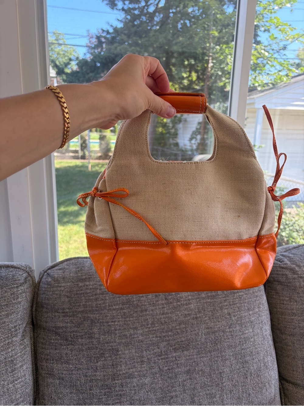 Canvas and Orange Leather Accent handbag